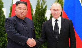 Image of: Putin and Kim: A Diplomatic Meeting in Beijing