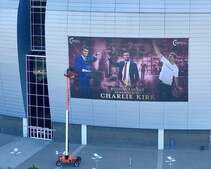 Image of: Massive Gathering in Arizona for Charlie Kirk Memorial with Trump Paying Tribute