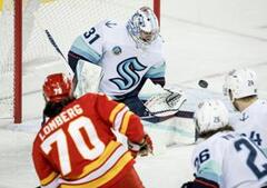 Image of: Grubauer Leads Kraken to Dominant 5-1 Victory Over Flames